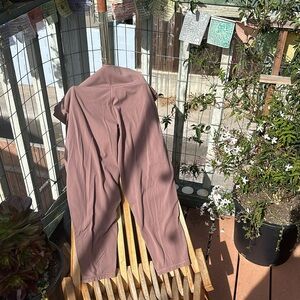 2X ATHLETA Salutation Stash 7/8 tight in a mauve dusty pink color. Some piling
